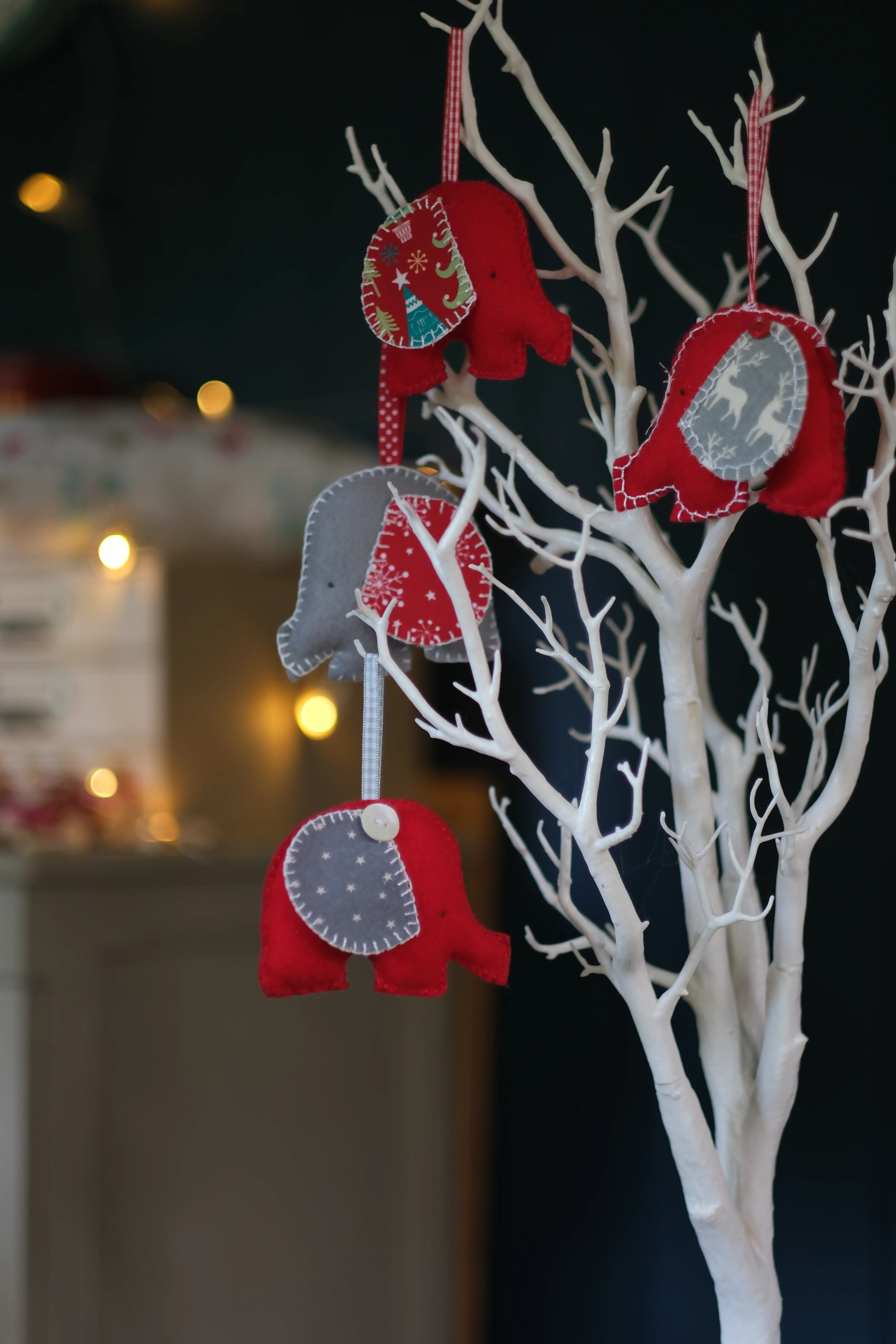 Red cushions with pompoms
